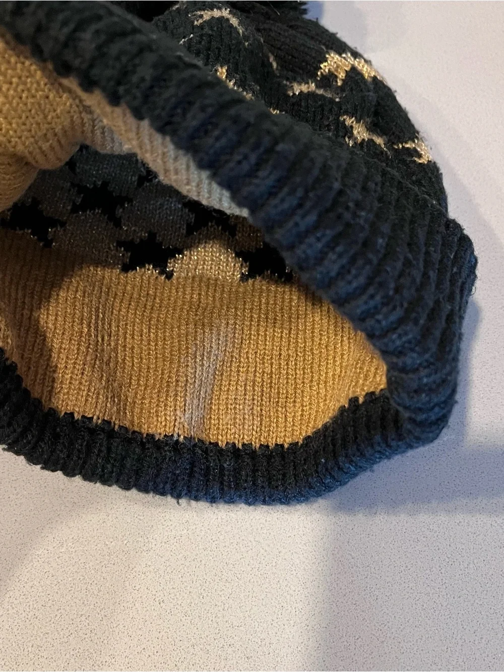 Neff Black Beanie with Gold Star Accents and Pom